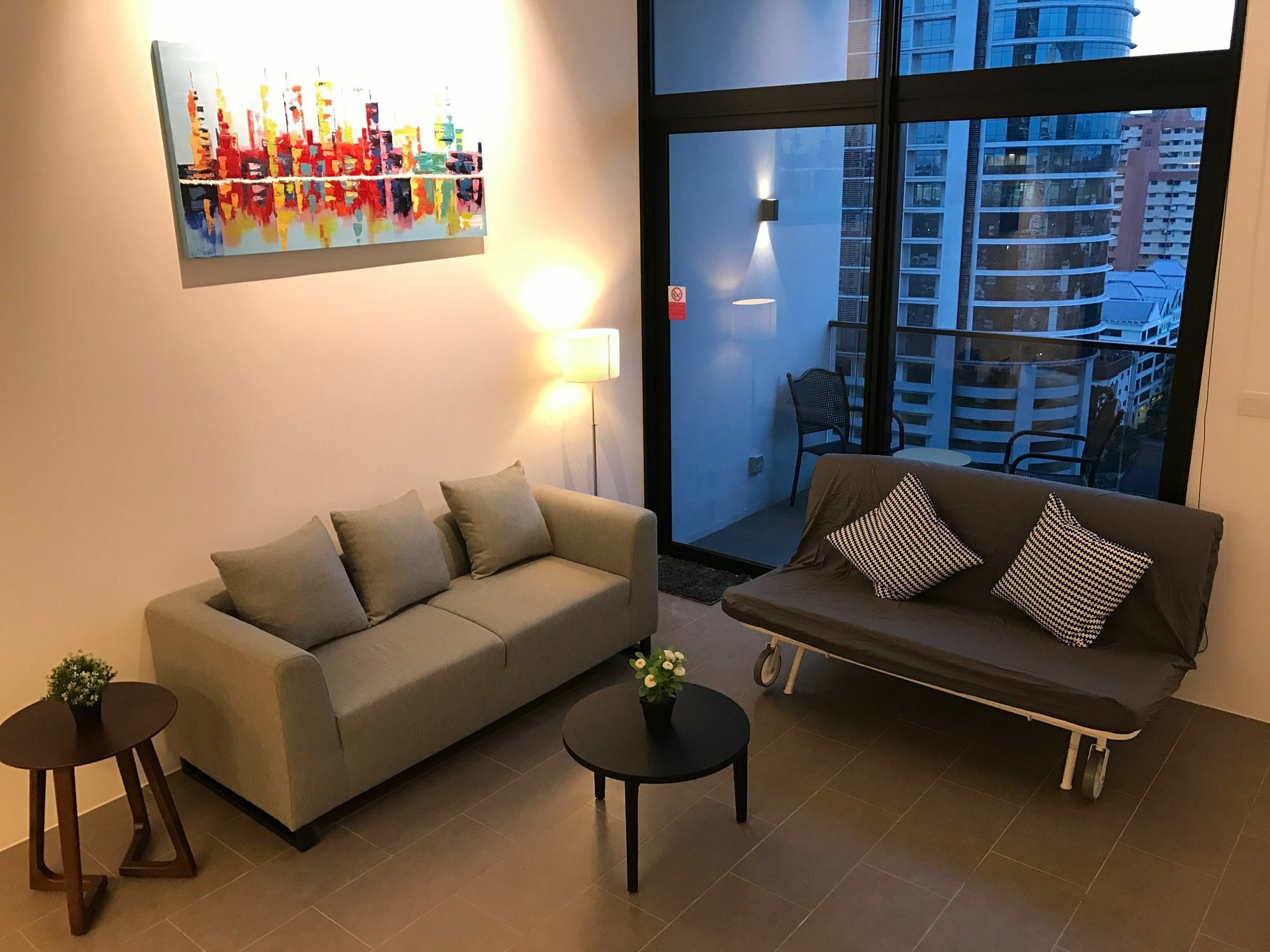 Alila Bangsar Kuala Lumpur Hotell Eksteriør bilde A living room with a sofa bed